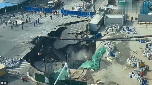 Massive Sinkhole Swallows Road in Shanghai Construction Site