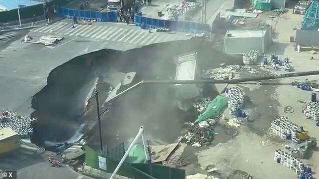 Massive Sinkhole Swallows Road in Shanghai Construction Site