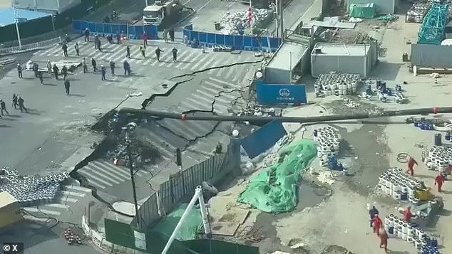 Massive Sinkhole Swallows Road in Shanghai Construction Site