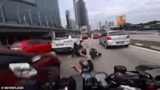 Unexpected Child's Action Triggers High-Speed Motorway Collision in Kuala Lumpur