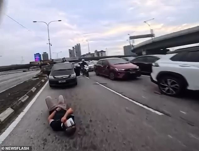 Unexpected Child's Action Triggers High-Speed Motorway Collision in Kuala Lumpur