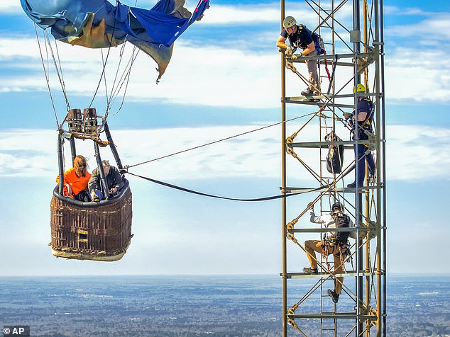 Dramatic Hot Air Balloon Rescue in Texas as Firefighters Scale Tower to Save Stranded Couple