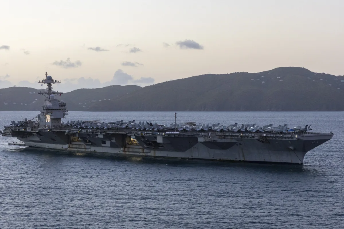Iran Warns U.S. Carrier Presence in Red Sea Poses Existential Threat, Eyes Targeting Supporting Infrastructure Amid Escalation Fears