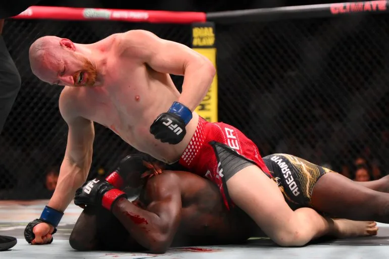 Israel Adesanya Suffers Rare Defeat as Joe Pyfer Secures TKO Victory in Second Round, Ending Four-Fight Winless Streak