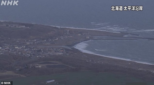Japan evacuates coast after 7.5-magnitude quake triggers massive tsunami waves.