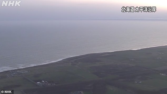 Japan evacuates coast after 7.5-magnitude quake triggers massive tsunami waves.