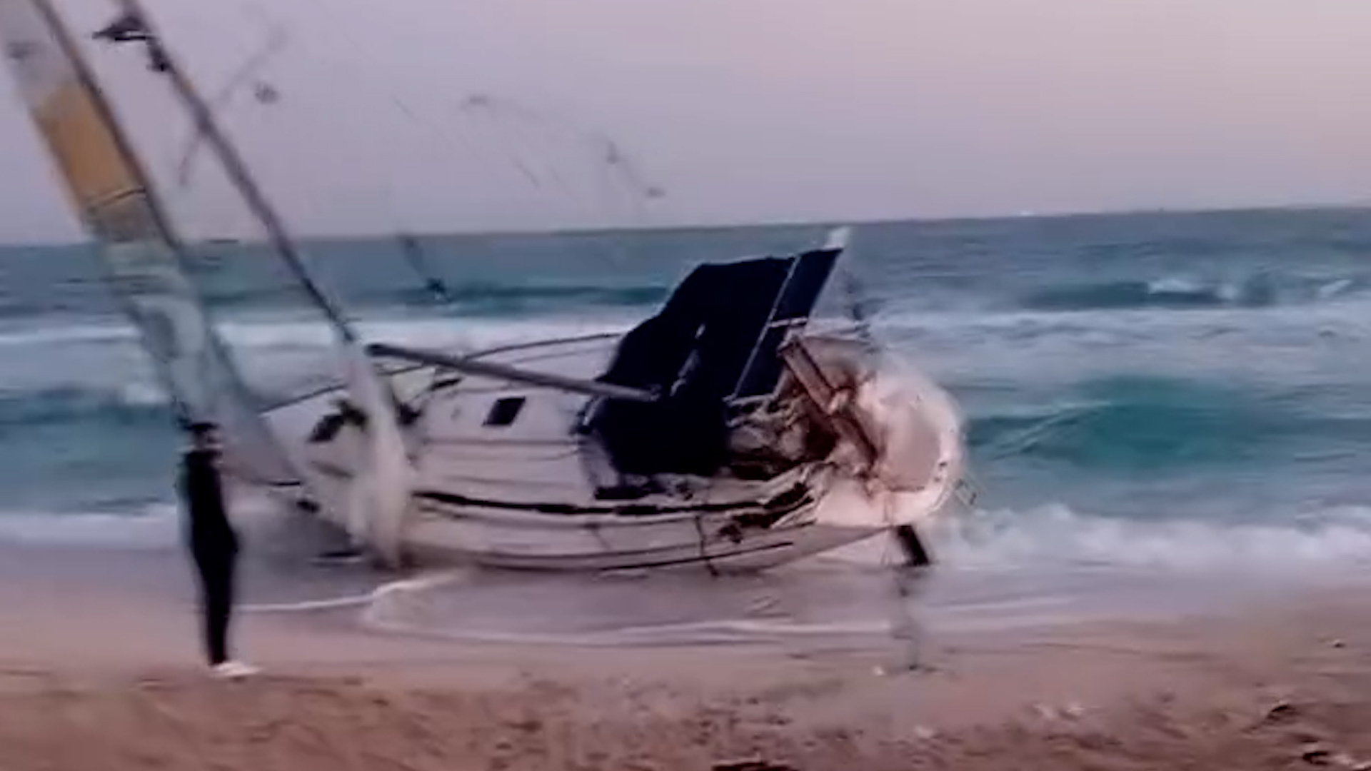 Abandoned Gaza aid flotilla ship washes ashore in Egypt after interception.