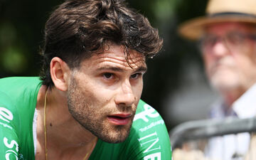 Giro d'Italia jury disqualifies Enrico Zanoncello for dangerous helmet strike.