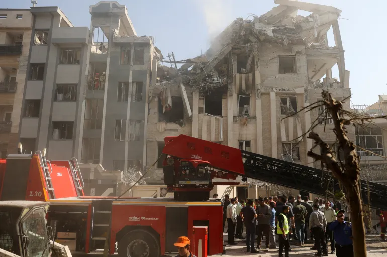 Iran's Precarious Position Mirrors Ukraine Amid Israeli Attack: Global Debate Over Motives and Western Response